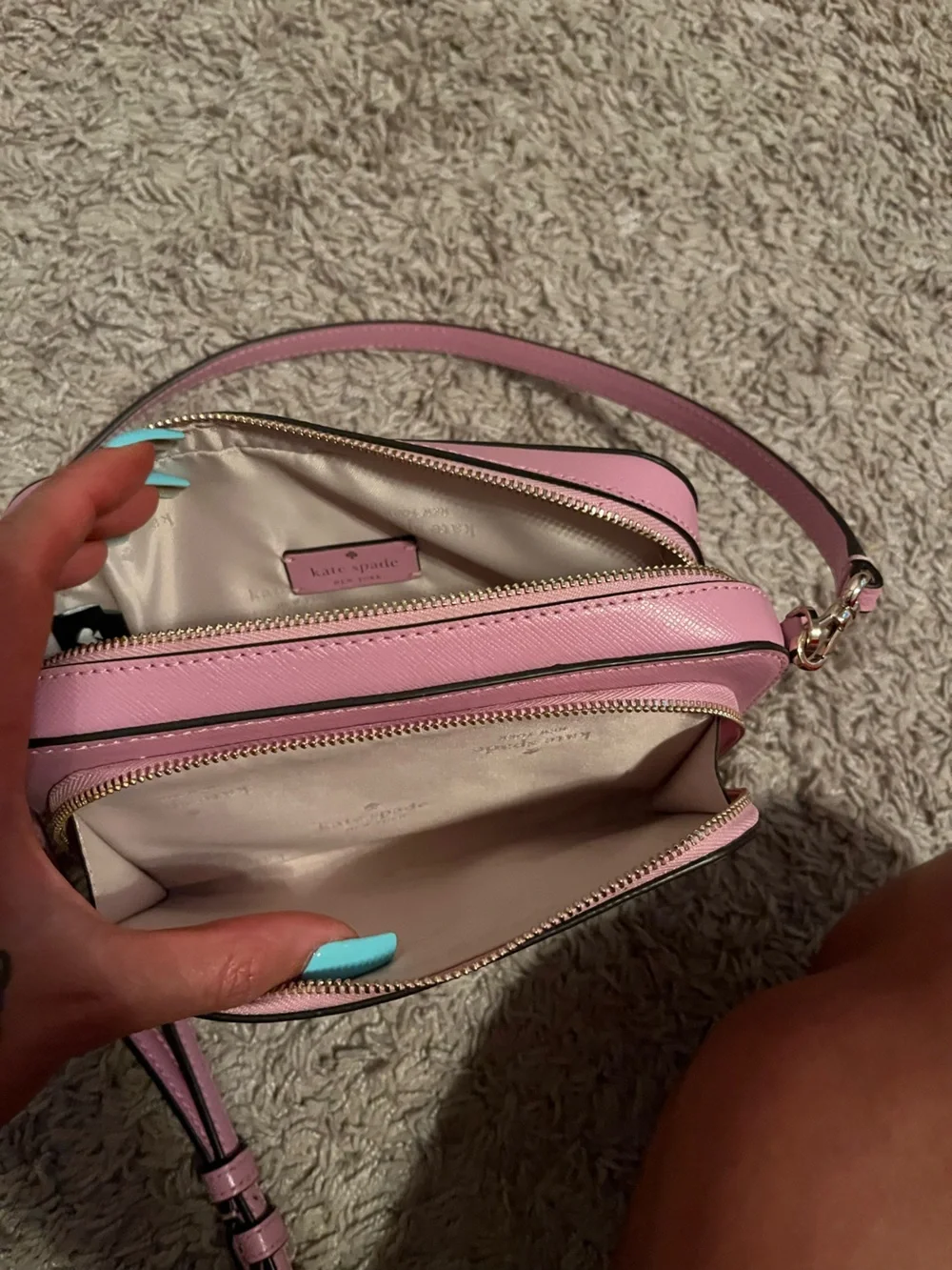 Kate Spade pink leather crossbody with gold logo